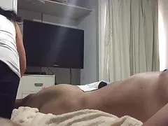 African woman plays with her chocolate bunny